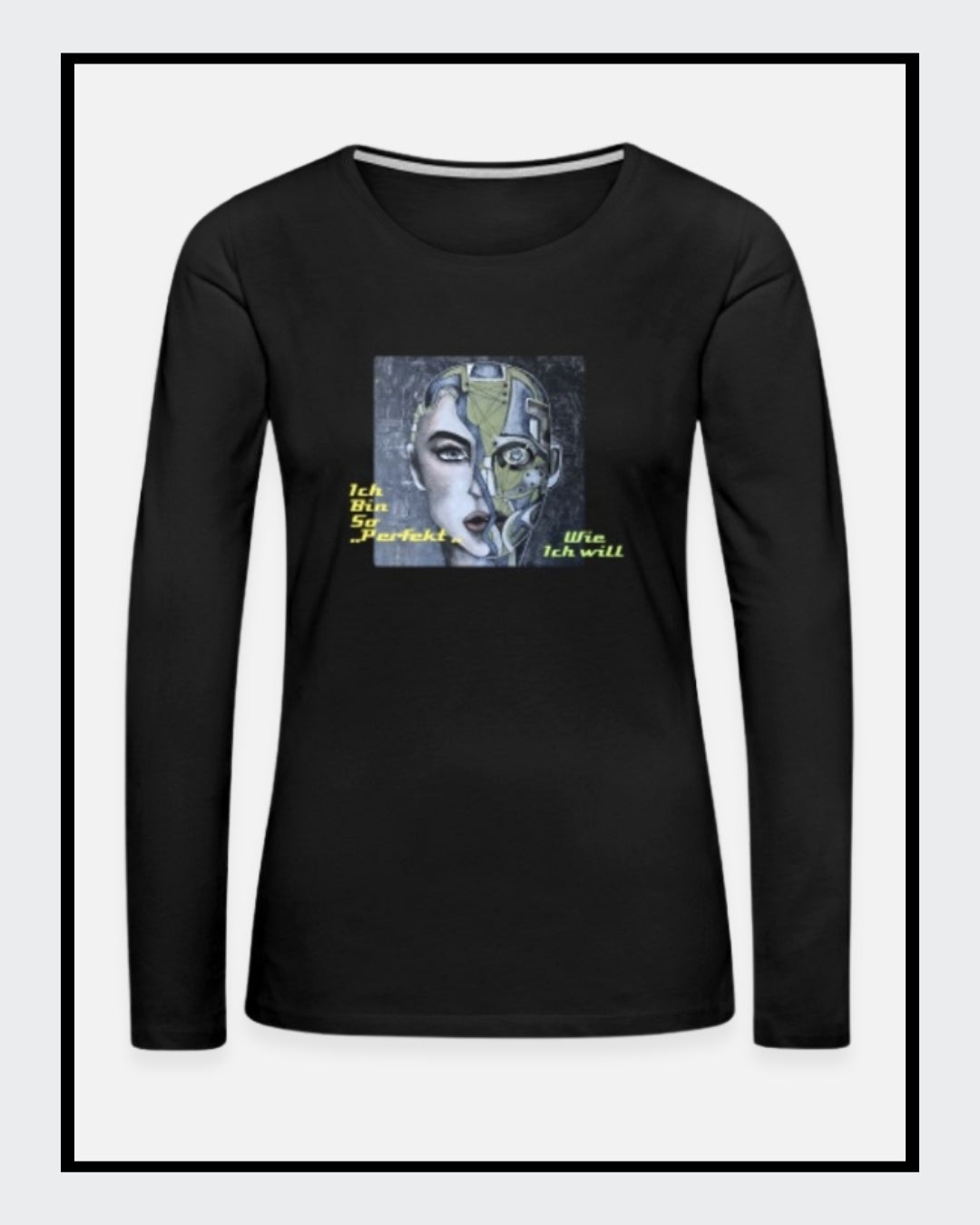 Ein schwarzes Langarmshirt mit einem Kunstwerk auf der Vorderseite. Das Motiv zeigt ein stilisiertes Gesicht, halb menschlich, halb futuristisch, mit der gelb-grünen Botschaft „Ich bin so 'PERFEKT' wie ich will“. Mode von "Soulfashion Lyrikherz & Springer" - erhältlich bei FEMARTSPACE - Artshop.