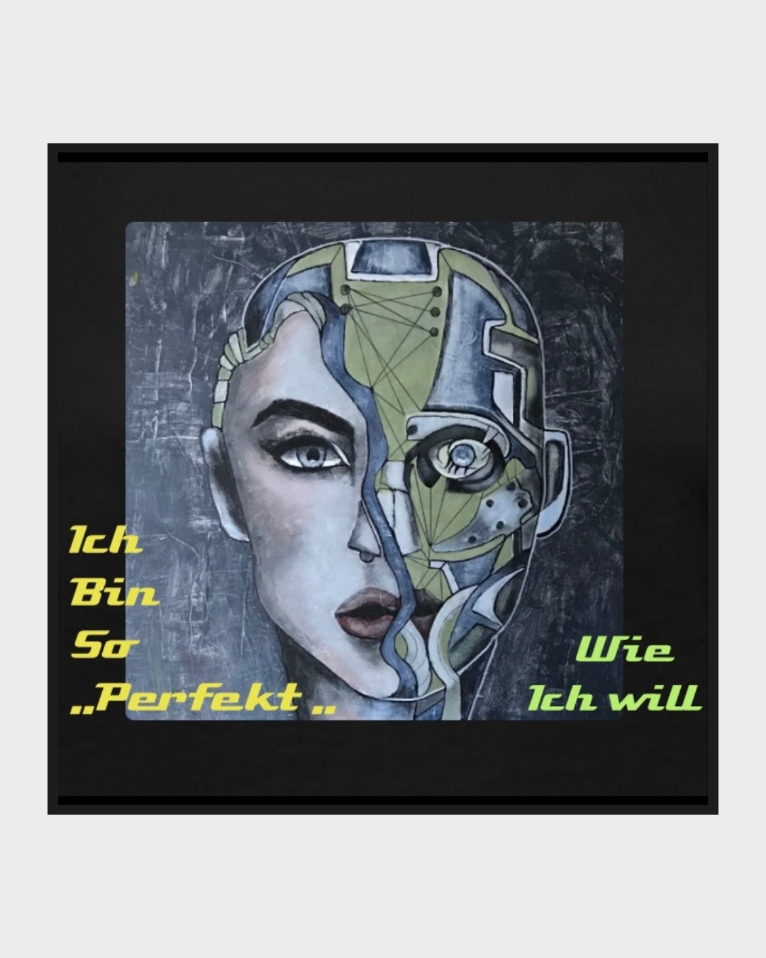 Ein schwarzes Langarmshirt mit einem Kunstwerk auf der Vorderseite. Das Motiv zeigt ein stilisiertes Gesicht, halb menschlich, halb futuristisch, mit der gelb-grünen Botschaft „Ich bin so 'PERFEKT' wie ich will“. Mode von "Soulfashion Lyrikherz & Springer" - erhältlich bei FEMARTSPACE - Artshop.