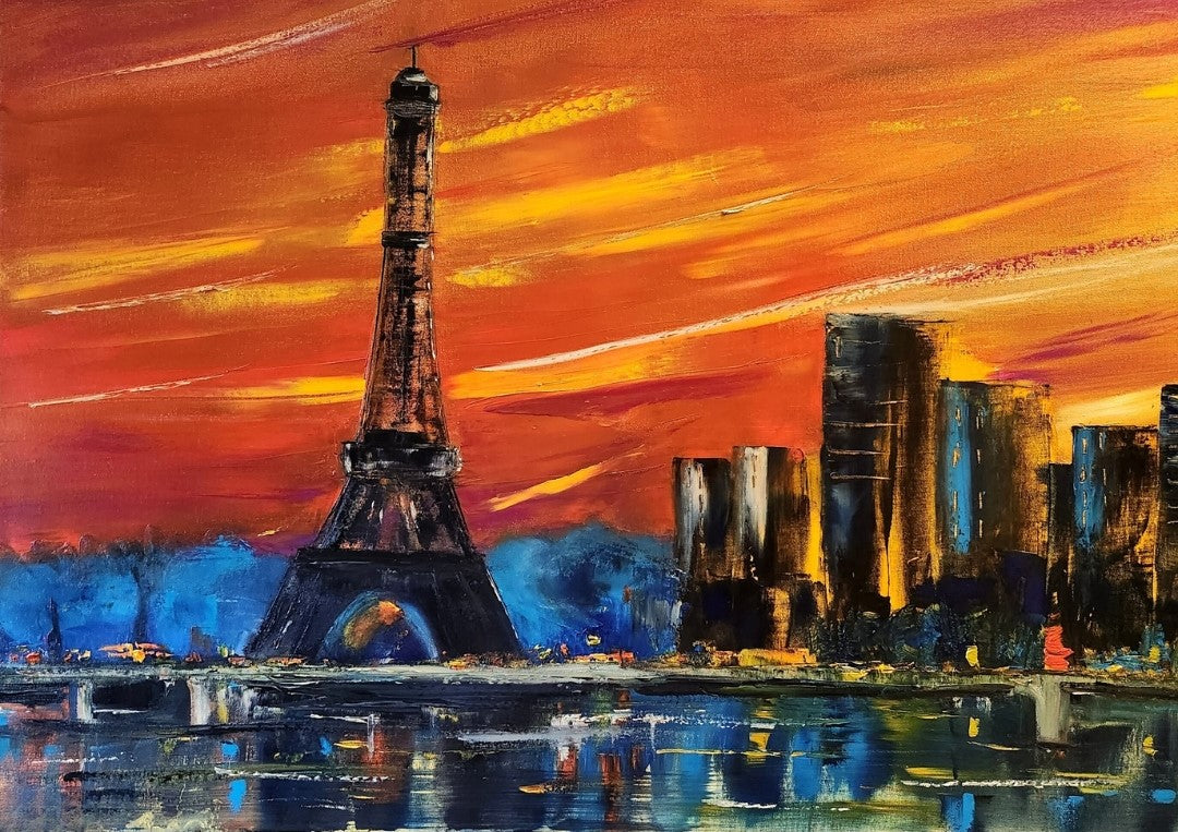 Das Gemälde “Paris” von Petra Erengil zeigt den Eiffelturm vor einem dramatischen Himmel in kräftigen Blau- und Orangetönen, mit moderner Architektur im Hintergrund. Die pastöse Technik verleiht dem Bild eine beeindruckende Textur und Tiefe.